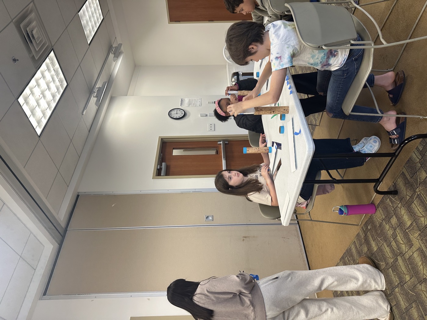 Students focused on a workshop activity